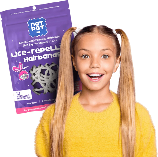 Smiling girl wearing NatPat's Kids Lice Repelling Hairbands on her ponytails, highlighting 