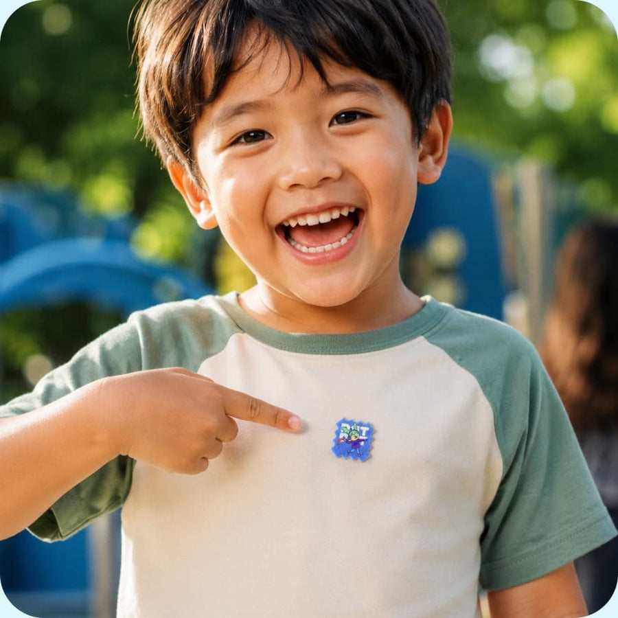A child wearing BuzzPatch mosquito repellent stickers on their clothing while playing outdoors.