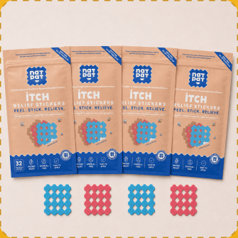 Four MagicPatch Itch Relief Stickers pouches standing side by side on a cream background, with four blue and pink grid-shaped patches laid out below them.