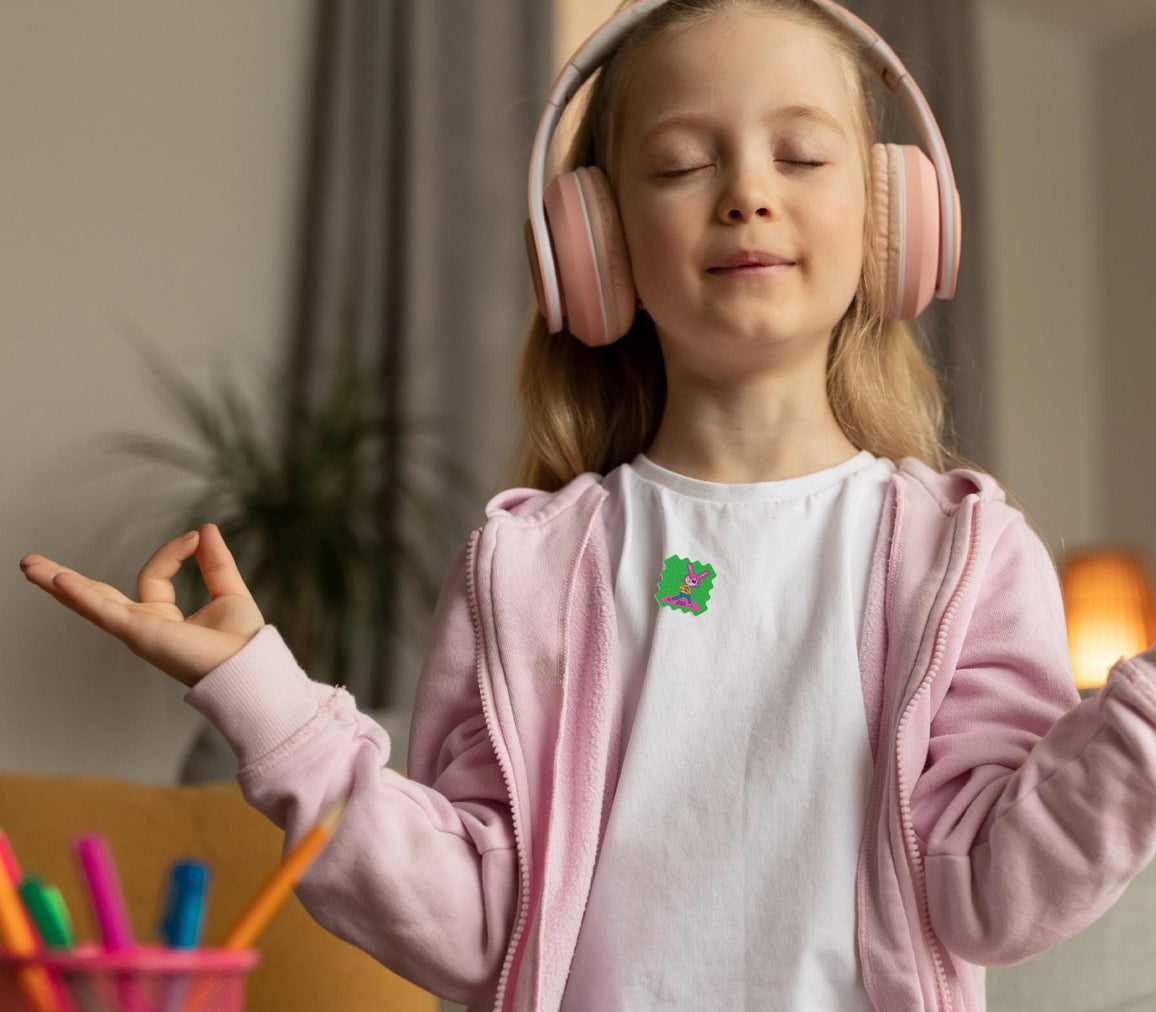 Child playing outside wearing a ZenPatch sticker