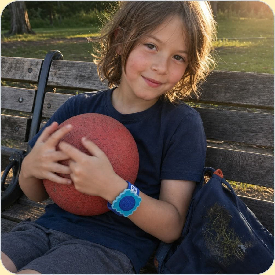 A child wearing the NATPAT mosquito repellent Slap Band outdoors.