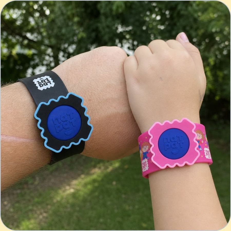 A child wearing the NATPAT mosquito repellent Slap Band outdoors.